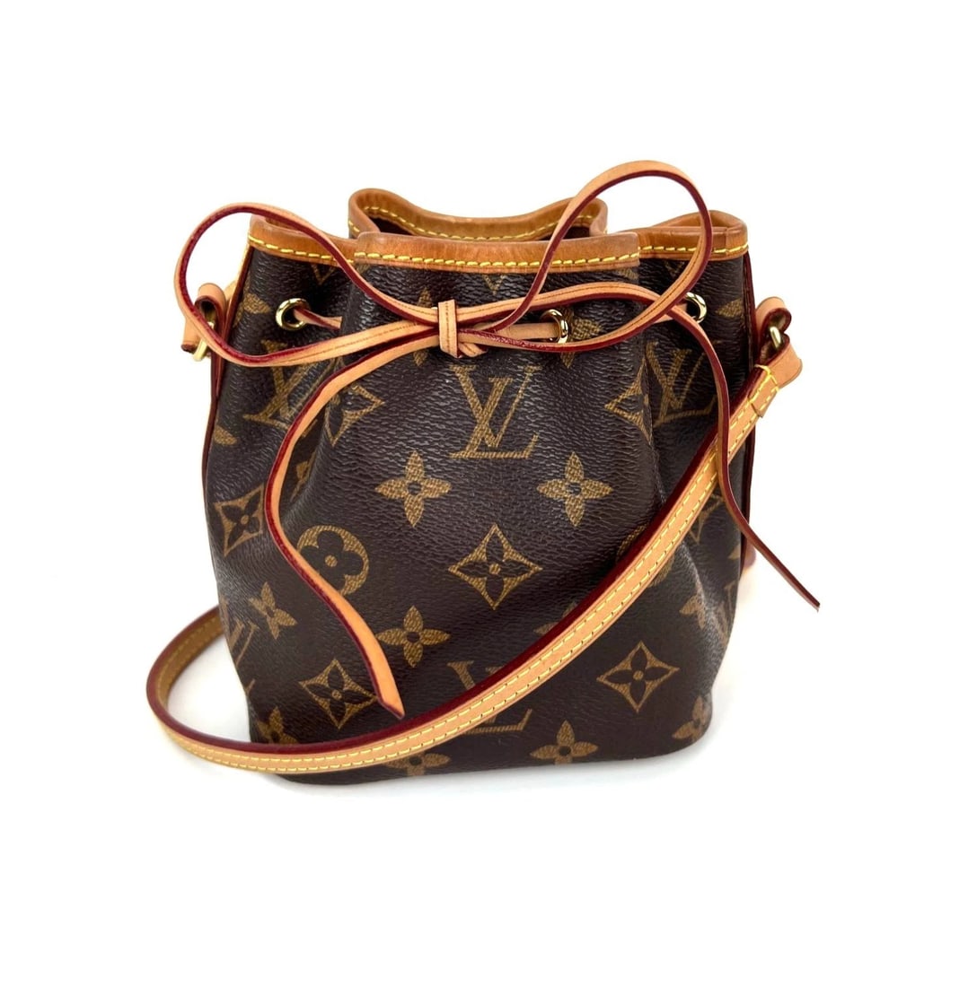 Louis Vuitton Monogram Nano Noe Bucket Crossbody Bag: Title: Louis Vuitton Monogram Nano Noe Bucket Crossbody Bag Description: Pre-Owned 100% Authentic Louis Vuitton Monogram Nano Noe Bucket Crossbody Bag RATING: A/B...Very Good, well maintained, shows
