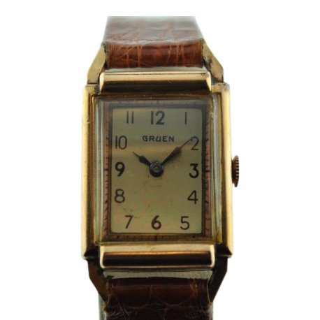 Gruen Two-Tone Pink Gold Silver Watch: Gruen Two-Tone Watch Pink gold and silver on the inside of the dial Manual wind movement The Gruen Watch Company was formerly one of the largest watch manufacturers in the United States. It was in bus