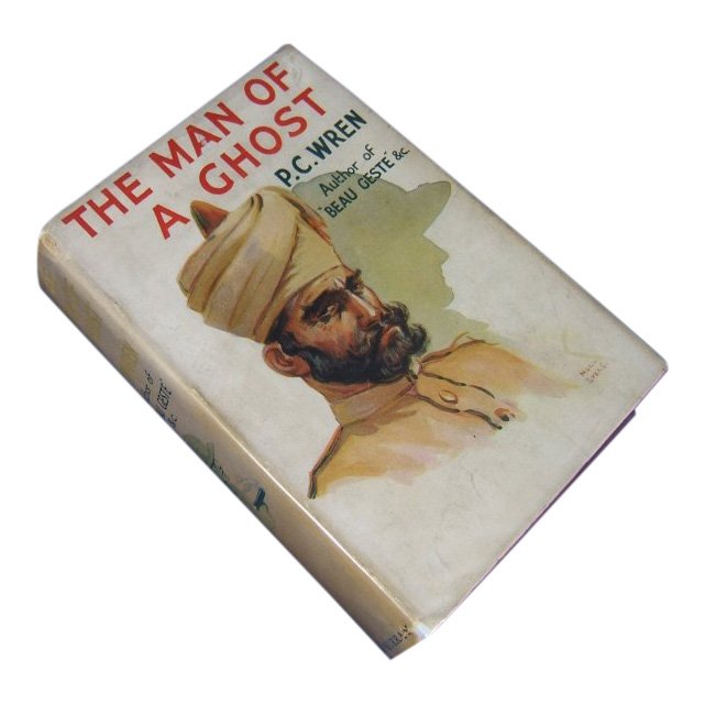 The Man Of A Ghost: Wren, P. C., The Man of a Ghost. London: John Murray, (1937). First Edition (so stated). Very Good copy (bowed, red cloth faded at top of spine but otherwise showing little if any wear) in a Very Good