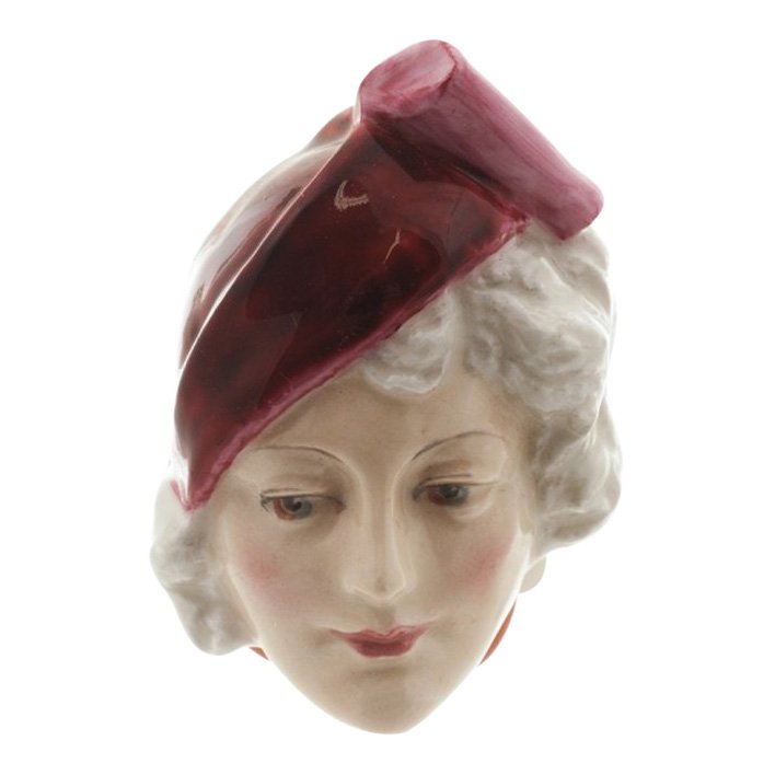 Royal Doulton: Lady in Stylish Hat Wall Mask: Royal Doulton Figurine, Lady in Stylish Hat Wall Mask Reference: HN1612 Height: 2.75 inches Royal Doulton is an English company producing tableware and collectables, dating from 1815. Operating origin