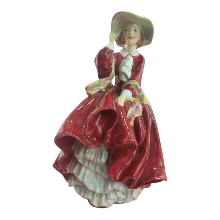 Royal Doulton Figurine: Top of the Hill: Maker: Royal Doulton Title: Top of the Hill Size: 7.5 inches tall Date: 1934-04 Reference: HN1834 Royal Doulton is an English company producing tableware and collectables, dating from 1815. Operating 