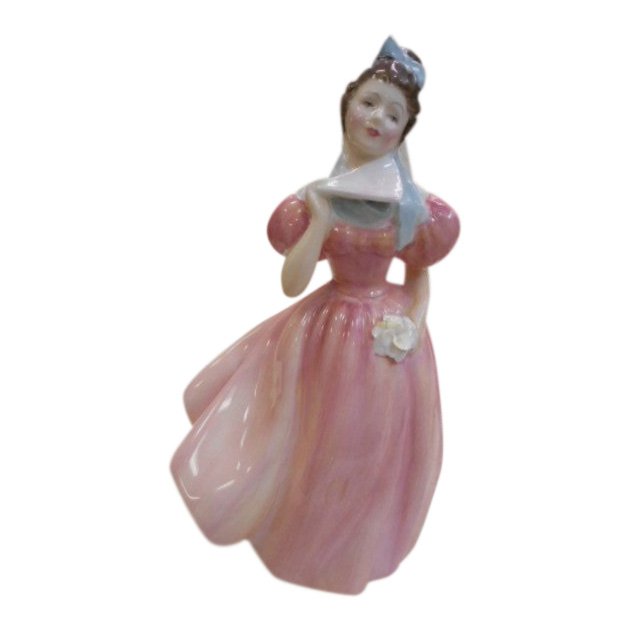 Royal Doulton Figurine: Camellia: Maker: Royal Doulton Title: Camellia Reference: HN 2222 Origin: England Size: 8 inches tall Royal Doulton is an English company producing tableware and collectables, dating from 1815. Operating origin