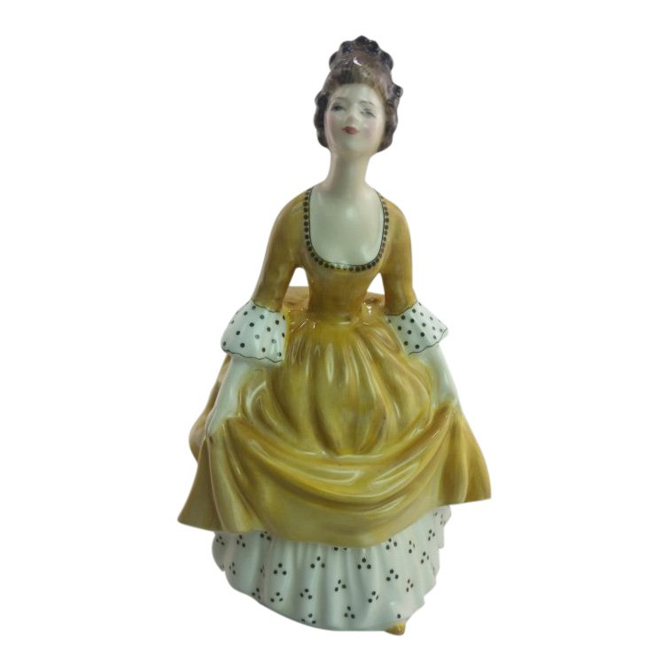 Royal Doulton Figurine: Coralie: Maker: Royal Doulton Title: Coralie Size: 7 inches tall Date: 1964-88 Reference: HN2307 Royal Doulton is an English company producing tableware and collectables, dating from 1815. Operating originally