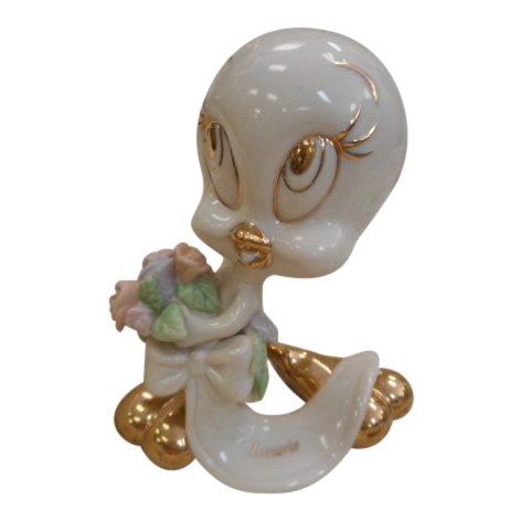 Lenox Figurine: Tweety Bird: Maker: Lenox Title: Tweety Bird with Laurie marked on it Size: 4.5 inches tall Lenox is an American company that specializes in tabletop, giftware, and collectible products, including porcelain figuri