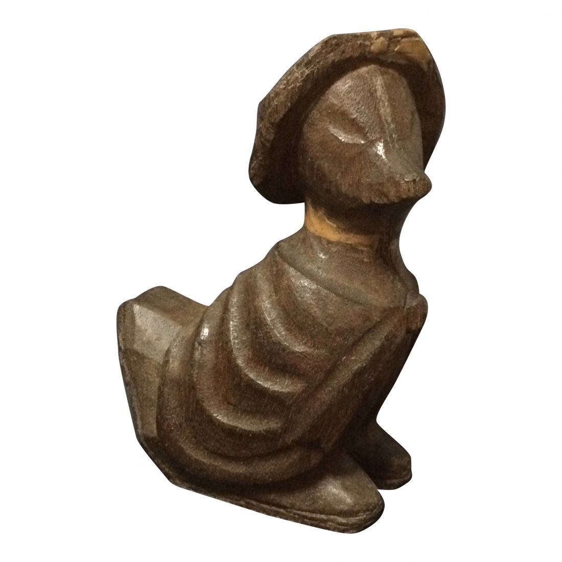 Duck: Duck Wood Carving Origin: Philippines Materials: "Takaan" Wood Carving Paper Mache Mold Dimensions: 6.5 inches high x 4.5 inches wide Takaan carvings are unique, handmade wooden folk sculptures used i