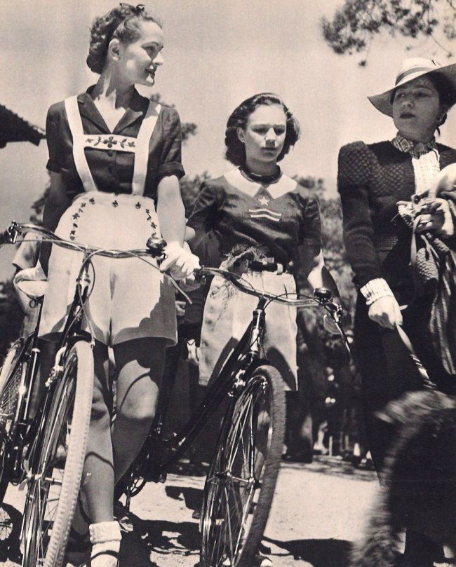 Brassai: Cyclists: Medium: Sheet-fed Gravure Date: 1939 Printer: Neogravure Company, France Image Size: 9 x 11 inches Brassai was a Hungarian-French photographer who rose to fame in France during the 20th century. He wa
