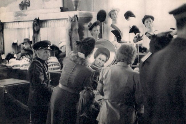 Cartier-Bresson: Hat Department at Store in Leningrad: Medium: Sheet-fed Copper Plate Gravure Date: 1955 Printer: Draeger Freres, France Image Size: 9 x 6 inches Henri Cartier-Bresson was a French photographer who specialized in humanist photography. He i