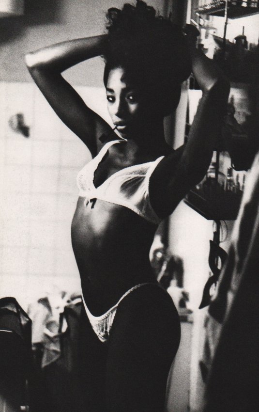 Ellen Von Unwerth: Faizah Fixing Hair: Medium: Sheet-fed Copperplate Gravure (on uncoated paper) Printed in Japan Date: 1995 Image Size: 9 x14 inches Ellen Von Unwerth is a German born photographer best known for photos of erotic femininit