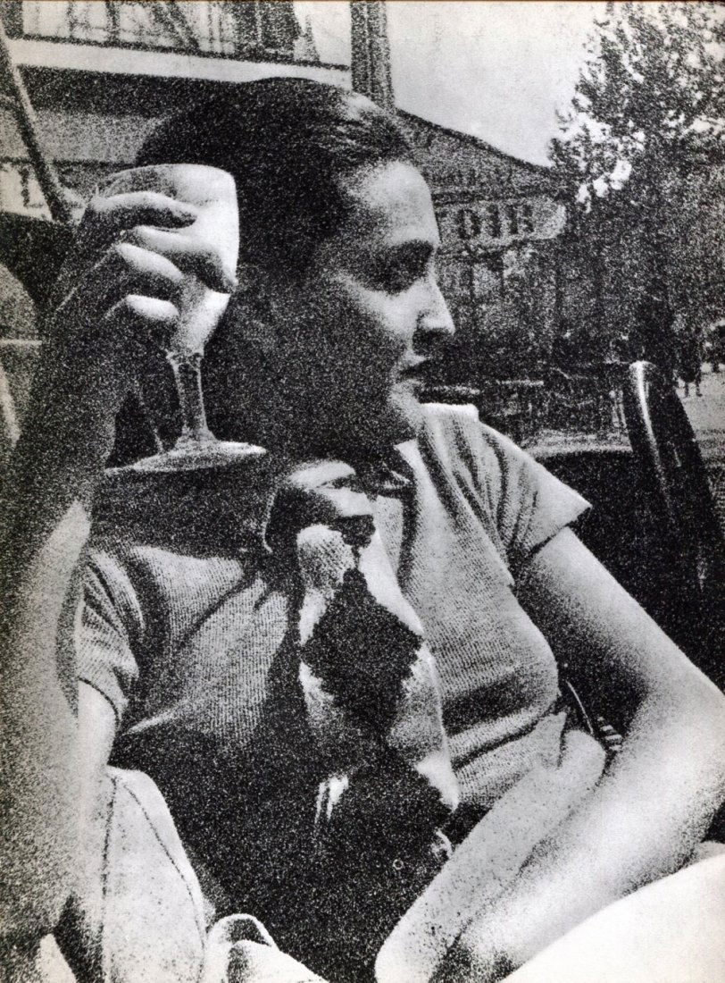 Man Ray: Woman with Drink: Medium: Sheet-fed Gravure Date: 1934 Printer: Neogravure Company, France Image Size: 9 x 10.5 inches Man Ray, original name Emmanuel Radnitzky was born on August 27, 1890 in Philadelphia, Pennsylvania