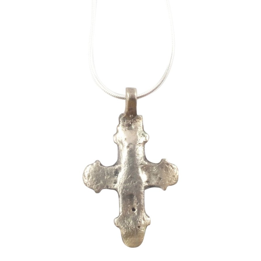 Byzantine Pilgrim's Reliquary Cross, 7th-10th C: Item: Byzantine Pilgrim's Reliquary Cross Date: 7th-10th Century Size: Approx. 1.5 inches high Pendant with trefoil design and low relief Corpus Christi. The back is recessed to allow for the inclusio