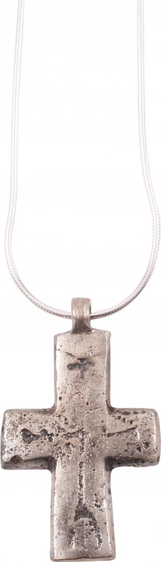 Silver Byzantine Pilgrim's Reliquary Cross, 6th-9th C: Item: Byzantine Pilgrim's Reliquary Cross Date: 6th-9th Century Material: Silver Size: 1.5 inches Vertical beam with shorter cross beam. The front with remnants of incised line decoration. Reverse rec