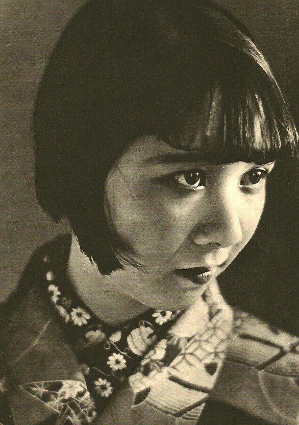 Yasuzo Nojima: Portrait: Medium: Vintage Sheet-fed Gravure Printer: Harrison and Sons Date: 1935 Image Size: 6 x 8 inches Yasuzo Nojima was a Japanese photographer born in 1889. He is particularly well known for his unidealiz