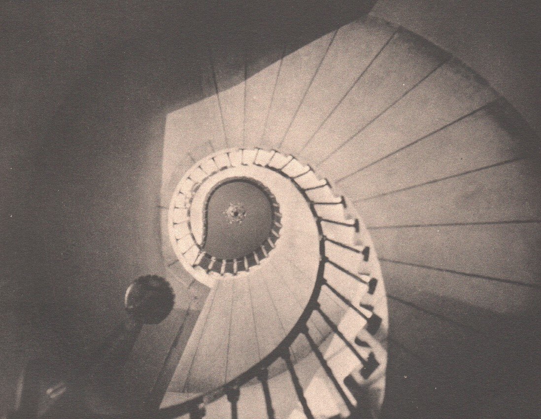 William M. Ritase: The Circular Stairway: Medium: Collotype Date: 1929 Printer: Meriden Gravure Company, USA Image Size: 7.5 x 5.5 inches William M. Rittase (1887-1968) was an American photographer active in Philadelphia during the 1920's and