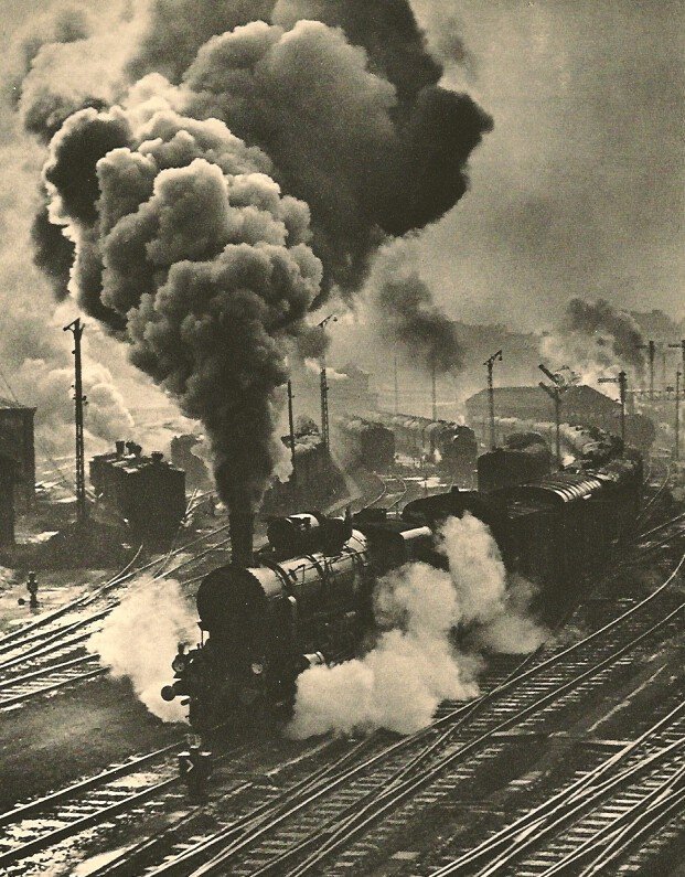 Erno Vadas: Locomotive: Medium: Vintage Sheet-fed Gravure Printer: Harrison and Sons Date: 1936 Image Size: 6 x 8 inches Erno Vadas was a Hungarian photographer born in Budapest in 1899. He became one of the most successful 