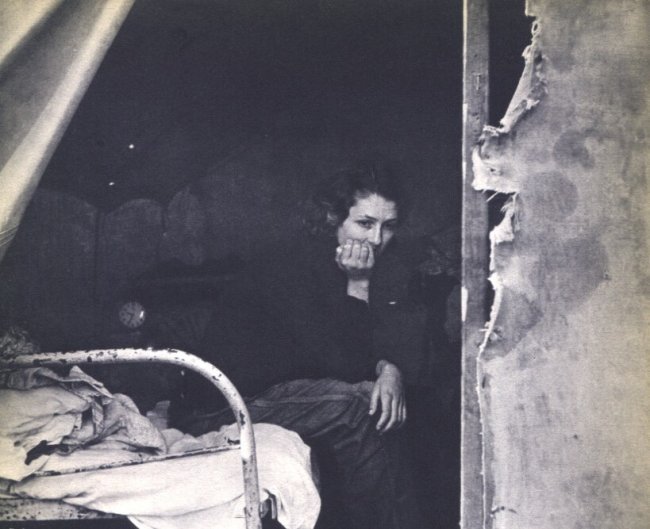 Dorothea Lange: FSA Photo, Woman on Bed: Gravure Title: FSA Photo, Woman on Bed Artist: Dorothea Lange Medium: Sheet-fed Copperplate Gravure Date: 1939 Printer: Beck Engraving Co., USA Size: 6.25 x 8.25 inches Dorothea Lange (1896-1965) was 