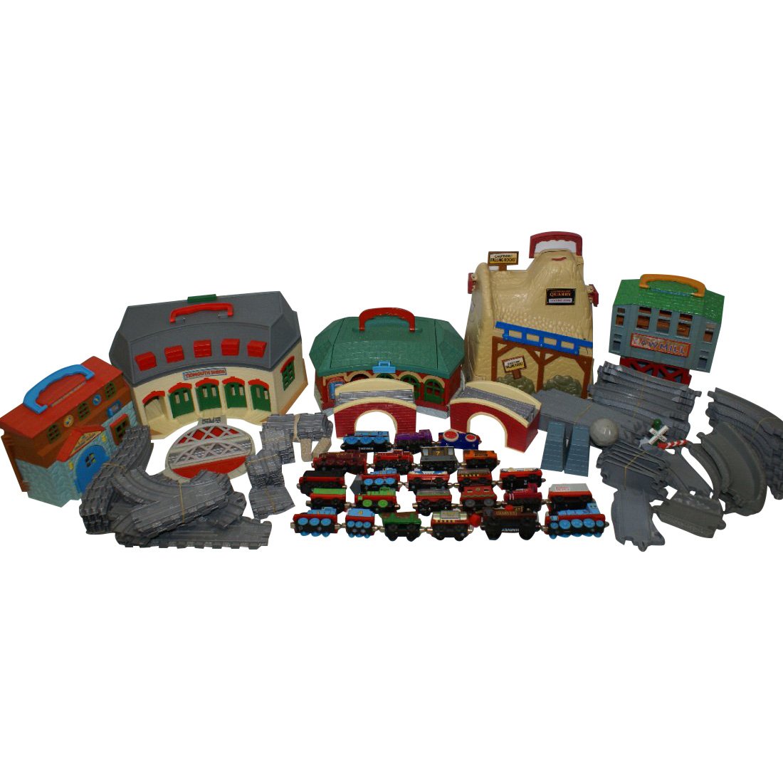 Thomas the Tank Train Set, 102 Pieces: Item: 102-piece Toy Set of Thomas the Tank Train Cars, Engines, Structures, Tracks, and Accessories Dates: 2002-2006 Weight: Over 20 lbs. Includes: 24 train cars, 5 building structures, and 73 various