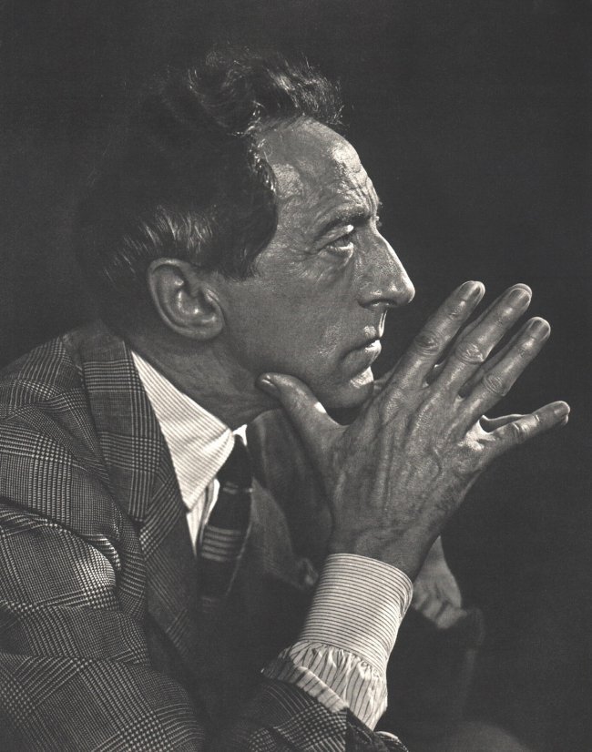 Yousuf Karsh: Jean Cocteau: Title: Jean Cocteau Artist: Yousuf Karsh Date: 1967 Printer: Enschede Haarlem, Netherlands Medium: Vintage Sheet-fed Gravure Image Size: 10 x 12 inches Yousuf Karsh was an Armenian-Canadian photograph