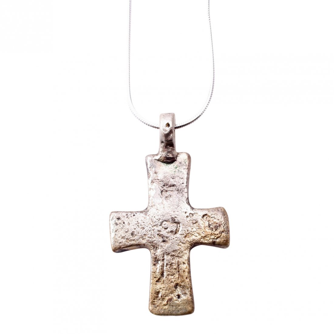 Byzantine Pilgrim's Reliquary Cross 9-12th C: Item: Byzantine Pilgrim's Reliquary Cross Date: 800-1100 A.D. Material: Silver overlay Size: 1 5/8 inches Has slightly flared beam terminals and rudimentary Corpus Christi. Back recessed for inclusion