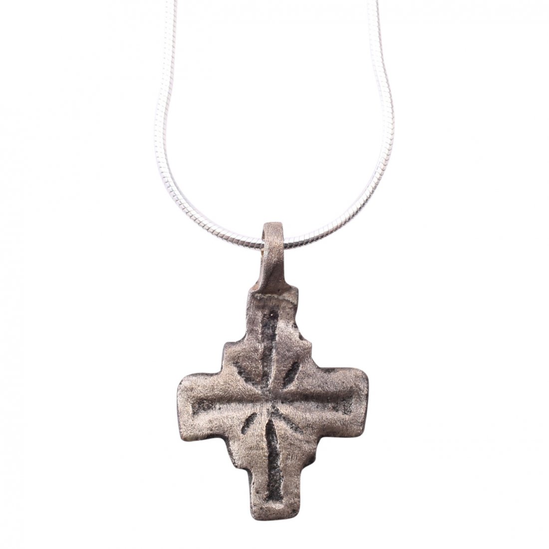 Byzantine Pilgrim's Cross 5-8th C: Item: Byzantine Pilgrim's Cross Date: 400-700 A.D. Material: Silver overlay Size: 1 inch Vertical beam with slightly shorter cross beam and a square at the junction. The front with broad line incised 