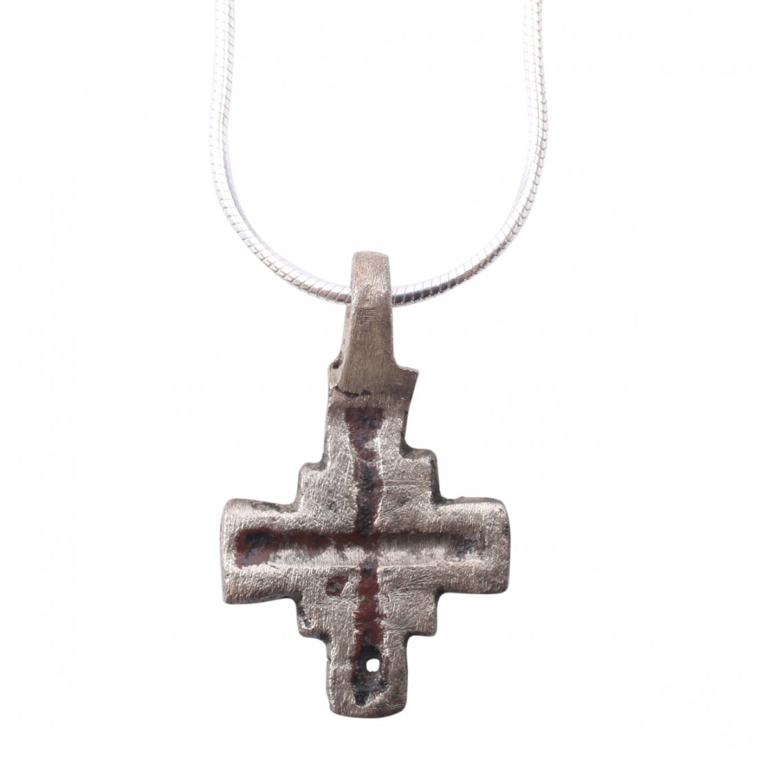 Byzantine Pilgrim's Cross 5-8th C: Item: Byzantine Pilgrim's Cross Date: 400-700 A.D. Material: Silver overlay Size: 1 inch Symmetrical, both beams of the same length with a square at the junction. The front with broad line incised cro
