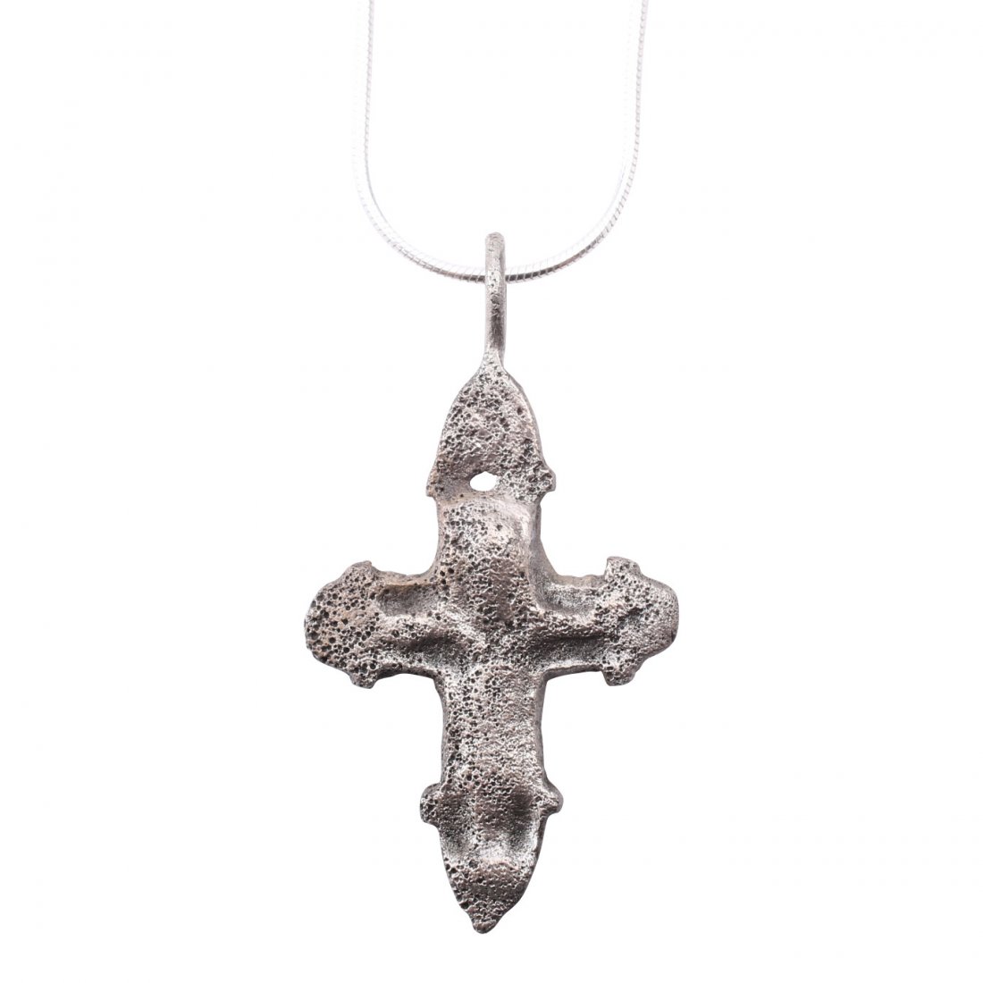 Byzantine Pilgrim's Reliquary Cross 9-12th C: Item: Byzantine Pilgrim's Reliquary Cross Date: 800-1100 A.D. Material: Silver overlay Size: 1 3/4 inches Trefoil beam terminals and low relief stylized Corpus Christi. The back recessed for inclusion