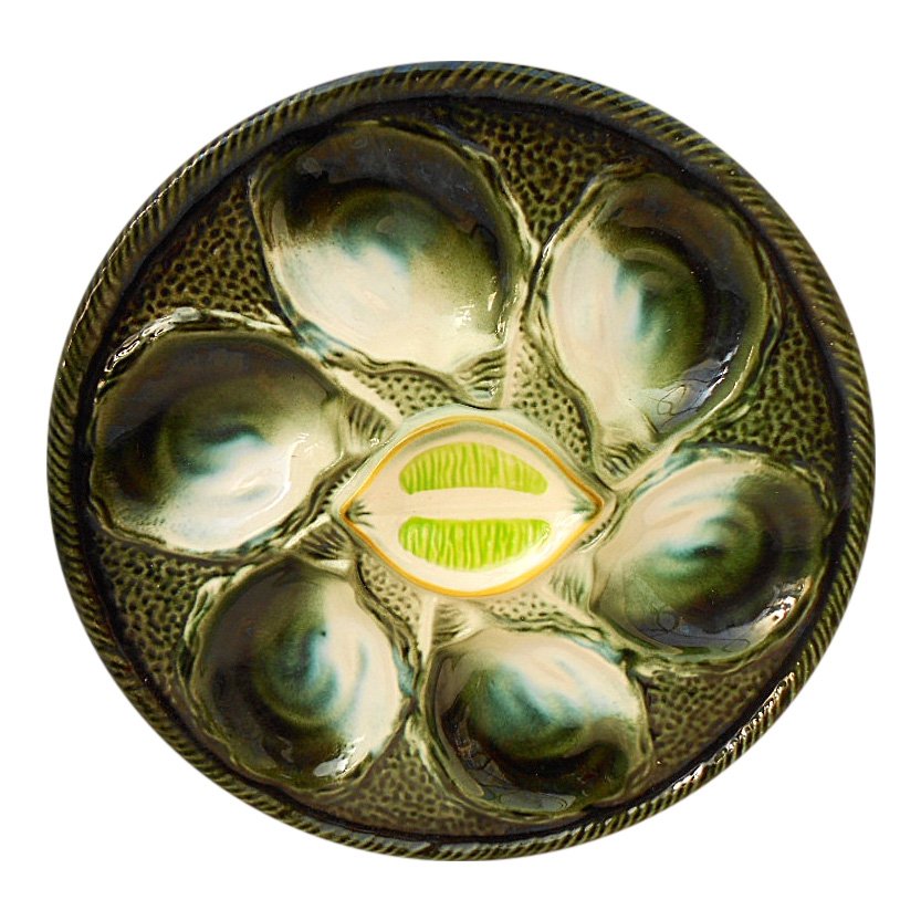 St. Clement Green Majolica Oyster Plate: Item: St. Clement Green Majolica Oyster Plate Weight: 1lb 15oz. Dimensions: 10 inches diameter Condition: No chips or cracks No Reserve: This lot starts at $1 and has no reserve as a courtesy so that 