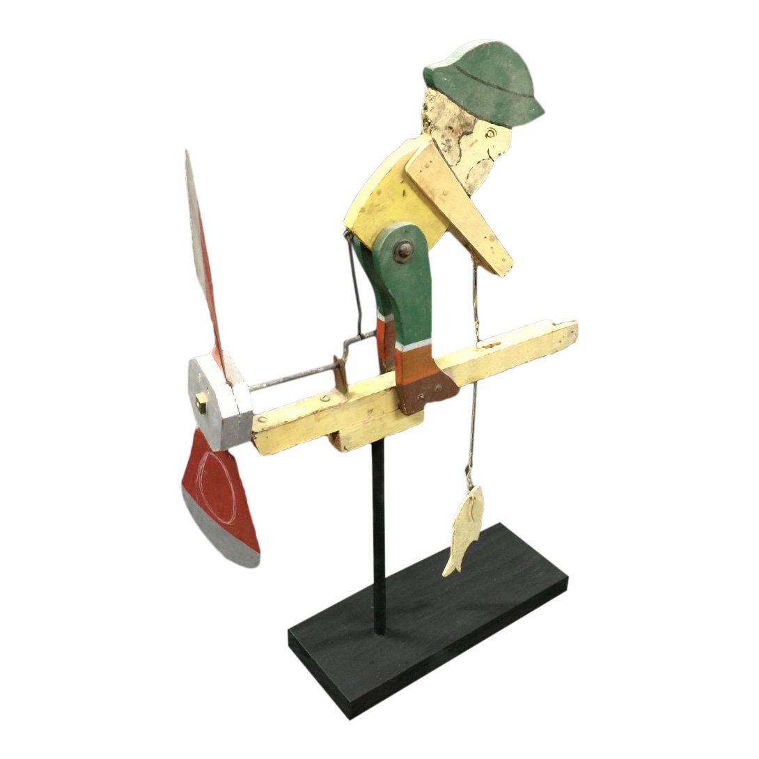 Handmade Fisherman Whirligig, 1960s: Item: Whirligig of fishermen Date: 1960s, mid-20th century Material: Wood and metal Dimensions: 11.5 long x 18.5 high x 13 wide Please note that this lot has a reserve. When you leave a bid in advance