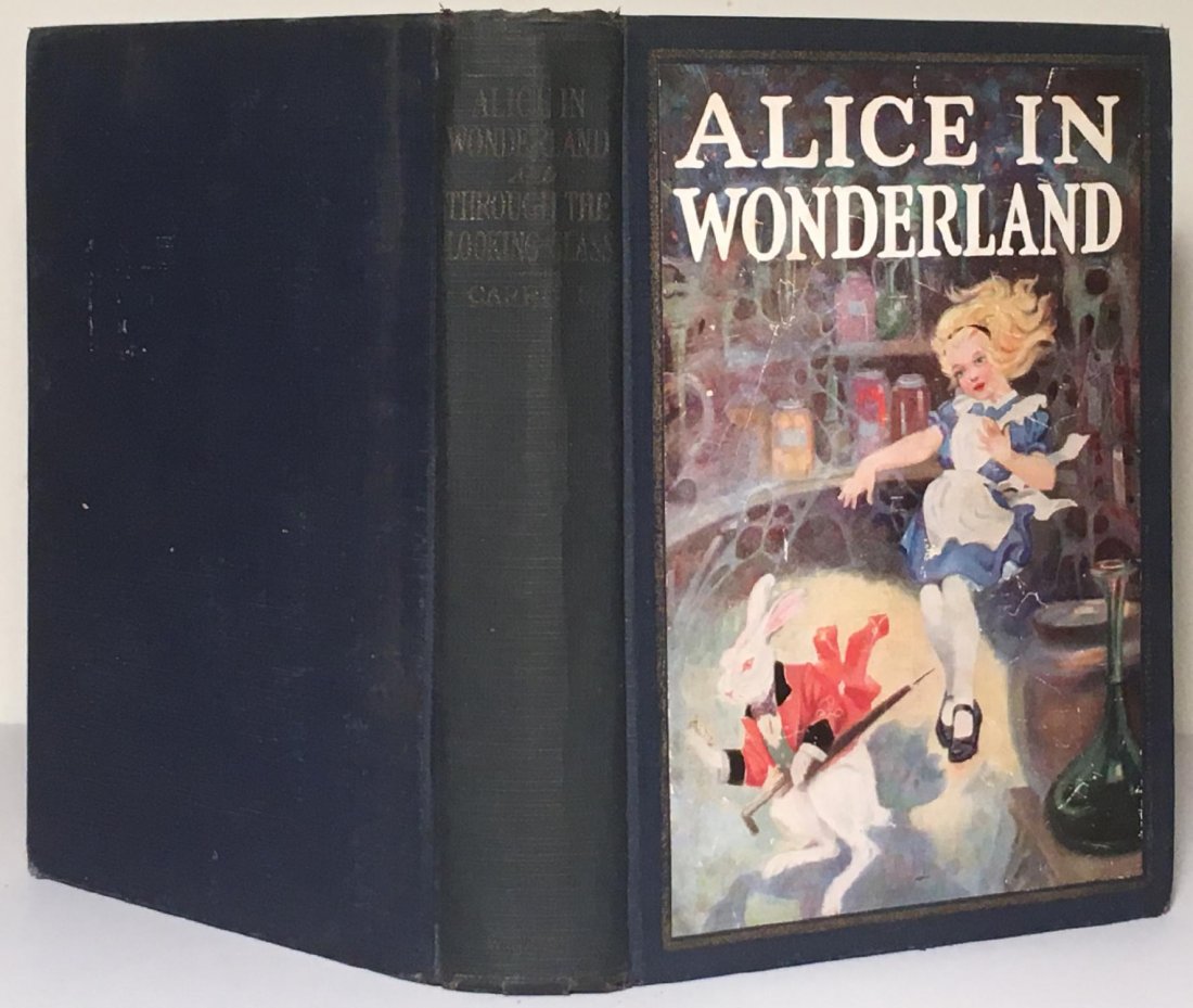Lewis Carroll: Alice in Wonderland: Book: Alice's Adventures in Wonderland & Through the Looking Glass Author: Lewis Carroll Publisher: John C. Winston Publication Date: 1923 Binding: Hardcover Book Condition: Good Dust Jacket Condition