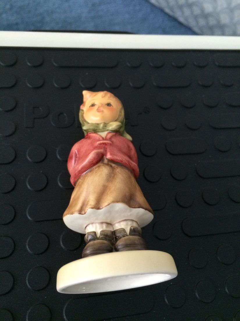 Hummel Figurine: Clear As A Bell: Figurine: Clear as a Bell Maker: Hummel Material: Porcelain Size: 3.75 inches TMK 8 M.I. Hummel Club - membership yr. - 2004/2005 Hummel Figurines are a series of porcelain figurines based on the draw