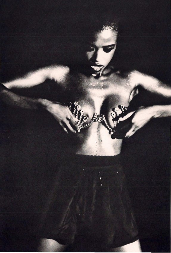 Ellen Von Unwerth: Lorraine Fixing Bra, Paris 1989: Print Title: Lorraine Fixing Bra, Paris 1989 Artist: Ellen Von Unwerth Medium: Sheet-fed Copperplate Gravure (on uncoated paper) Printing Location: Japan Print Date: 1995 Image Size: 9 x 14 inches Ell