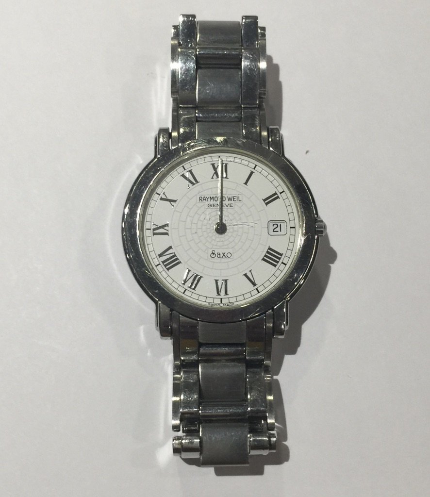 Raymond Weil Stainless Steel Saxo Watch: Domestic: Free Shipping Item: Raymond Weil Saxo Watch Material: Stainless steel Case: 36mm head Movement: Quartz Steel bracelet has hidden clasp bracelet Raymond Weil is a Swiss luxury watchmaker, fou