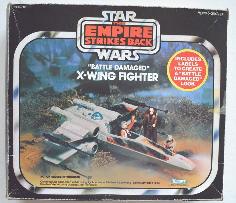 Star Wars Battle Damaged X-Wing Toy Fighter: Toy: Star Wars Empire Strikes Back "Battle Damaged" X-Wing Fighter Item #: 69780 Maker: Kenner Features: One spaceship with flashing light and sound, labels for new and "battle damaged" look Uses 2 AA
