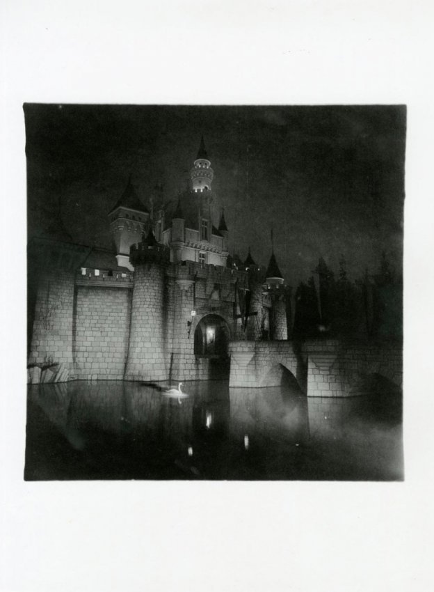 Diane Arbus: A Castle in Disneyland, 1962: Print Title: A Castle in Disneyland, 1962 Artist: Diane Arbus Printing Date: 1979 Medium: Heliogravure with tissue guard Printed In: Italy Image Size: 15.75 x 11.6 inches Diane Arbus was an American p