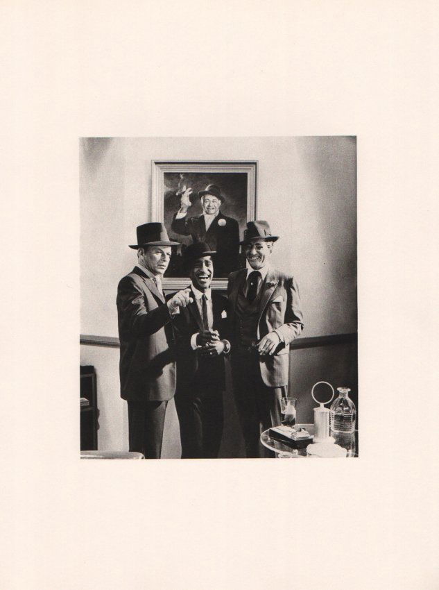 Cecil Beaton: Rat Pack: Print Title: Rat Pack Artist: Cecil Beaton Printing Date: 1982 Medium: Sheet-fed Gravure Printed In: Italy Image Size: 6.5 x 8 inches Paper Size: 11.5 x 16 inches Cecil Beaton was an English fashion,