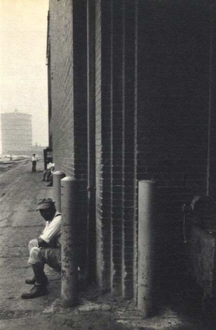 Robert Frank: Factory, Detroit: Print Title: Factory, Detroit Artist: Robert Frank Printing Date: 1958 Medium: Vintage Sheet-fed Gravure Printed In: France Image Size: 4.5 x 6.5 inches Robert Frank (b. 1924) is an American photograp