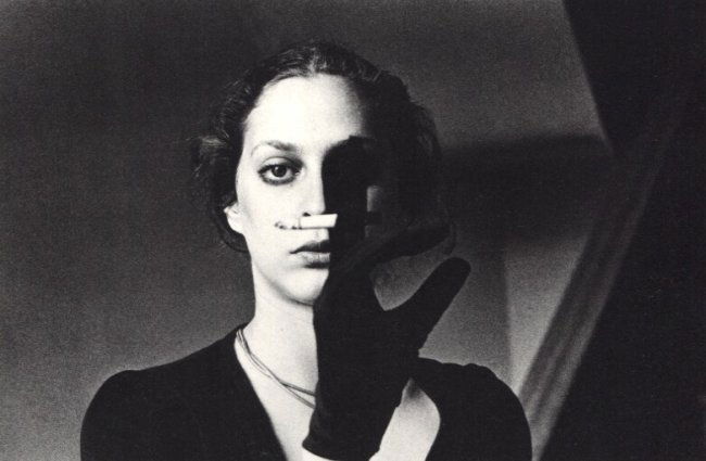 Ralph Gibson: Cigarette: Print Title: Cigarette Artist: Ralph Gibson Printing Date: 1974 Medium: Sheet-fed Gravure Printed In: New York Image Size: 7.5 x 5 inches Ralph Gibson is an American art photographer who was born in C