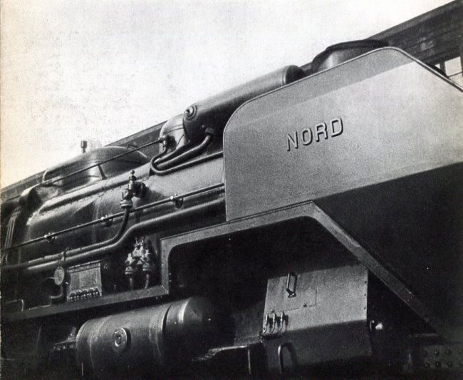 Man Ray: Gare du Nord: Print Title: Gare du Nord Artist: Man Ray Printing Date: 1934 Medium: Vintage Sheet-fed Gravure Printer: La Neogravure, France Image Size: 9 x 7 inches Man Ray, original name Emmanuel Radnitzky, was b