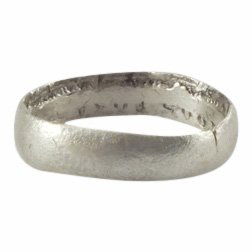 Viking Woman’s Wedding Ring 850-1050 A.D.: Jewelry: Viking Woman’s Wedding Ring Date: 850-1050 A.D. Size: 4 Material: Silver overlay For wear on the small finger as was the custom. Very broad band with rounded face. Vikings exchanged rings o