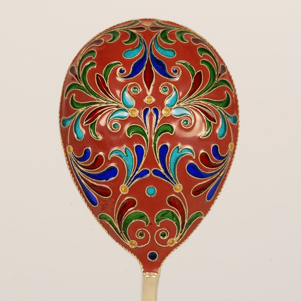 Russian gilded silver & plique-a-jour serving spoon: A Russian gilded silver, cloisonné, and plique-à-jour enamel serving spoon, Grachev Brothers, ST Petersburg, circa 1890. The egg-shape bowl pierced with scrolling foliate motifs and decorated with p
