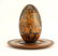 A Russian kustar art carved wood Easter egg & stand