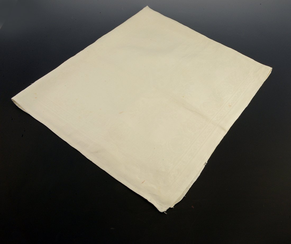 Duke Alexander Alexandrovich: A Damask Dinner Napkin: Grand Duke Alexander Alexandrovich (Emperor Alexander III): A Damask Dinner Napkin. Rectangular, centered with a wreath set with flowers, the four corners with the Emperor’s Grand Ducal Imperial cyp