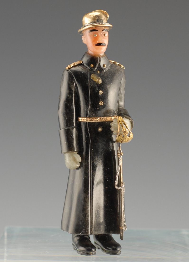 A carved hardstone Faberge-style figure (1 of 6)