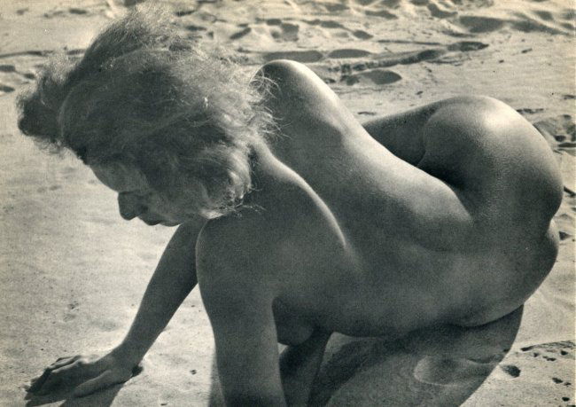 Raoul Hausmann: Nude on Sand: Print Title: Nude on Sand Artist: Raoul Hausmann Medium: Vintage Sheet-Fed Gravure Printing Date: 1935 Printer: La Neogravure, France Image Size: 9 x 6.5 inches No Reserve: This lot starts at $1 and h
