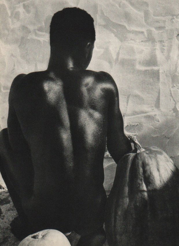 Herbert List: Male with Gourd: Print Title: Male with Gourd Artist: Herbert List Printing Date: 1954 Medium: Sheet fed Copperplate Gravure Printer: Braun & Cie, Germany Image Size: 7.5 x 10.5 inches Herbert List was a German photog