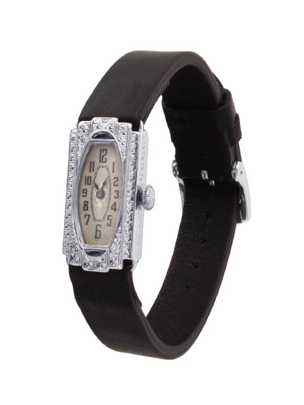 Willard Watch Company 18K White Gold Watch: Item: Antique Willard Watch Company 18K White Gold Ladies Watch Case Serial: 89554 Markings: Engraved "Marion from Leland 1928", stamped "89554 18K" Movement: 17 jewels, manual wind Bracelet: Leather 