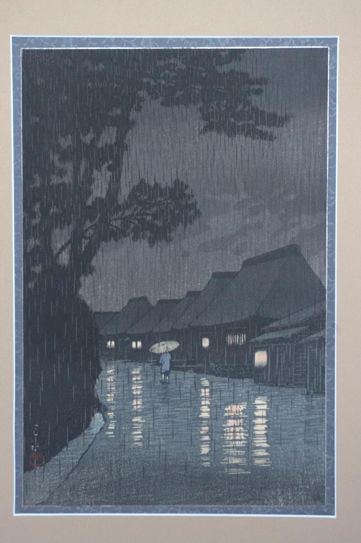 Hasui Kawase: Rainy Night in Maekawa: Artist: Hasui Kawase Title: Rainy Night in Maekawa Date: 1922 Medium: Japanese Woodblock Print Print Size: 10 x 14.75 inches Mat Size: 16 x 20 inches Hasui Kawase (1883-1957) was a Japanese artist and