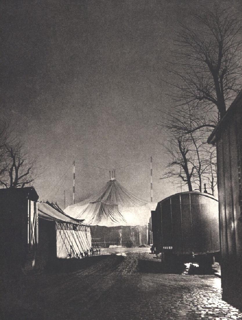 Brassai: Midnight, after the Fete: Print Title: Midnight, after the Fete Artist: Brassai Medium: Sheet-Fed Gravure Printer: La Societe D'Impressions Lorraines - Nancy, France Printing Date: 1987 Image Size: 7 x 9.5 inches Brassai was a