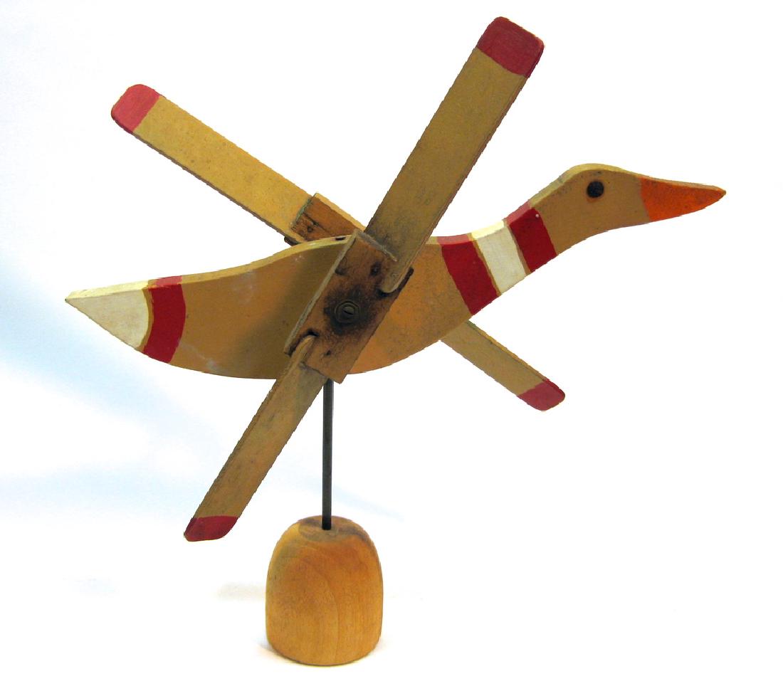 Solid Wood Duck Whirligig: Item: Duck Whirligig Material: Solid wood Size: 16 inches long Please note that this lot has a reserve. When you leave a bid in advance of the auction, submit your maximum. Jasper52 will bid on your b