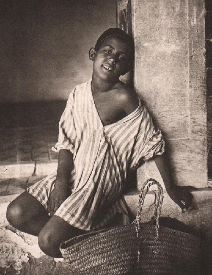 Lehnert & Landrock: Arabian Boy: Print Title: Arabian Boy Artist: Lehnert & Landrock Medium: Collotype on Velin Arches thick cotton paper Printing Date: 1985 Printer: Institut d'Orient Image Size: 7.5 x 9.5 inches Paper Size: 10.5 x 