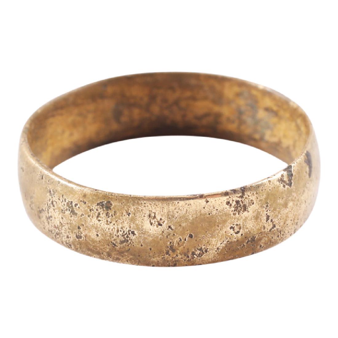 Viking Woman's Wedding Ring, 850-1050: Item: Viking Woman's Wedding Ring Date: 850-1050 AD Material: Bronze Size: 8.5 Broad band with rounded face. Vikings exchanged rings on the pommel of the groom’s sword. All items purchased are accom